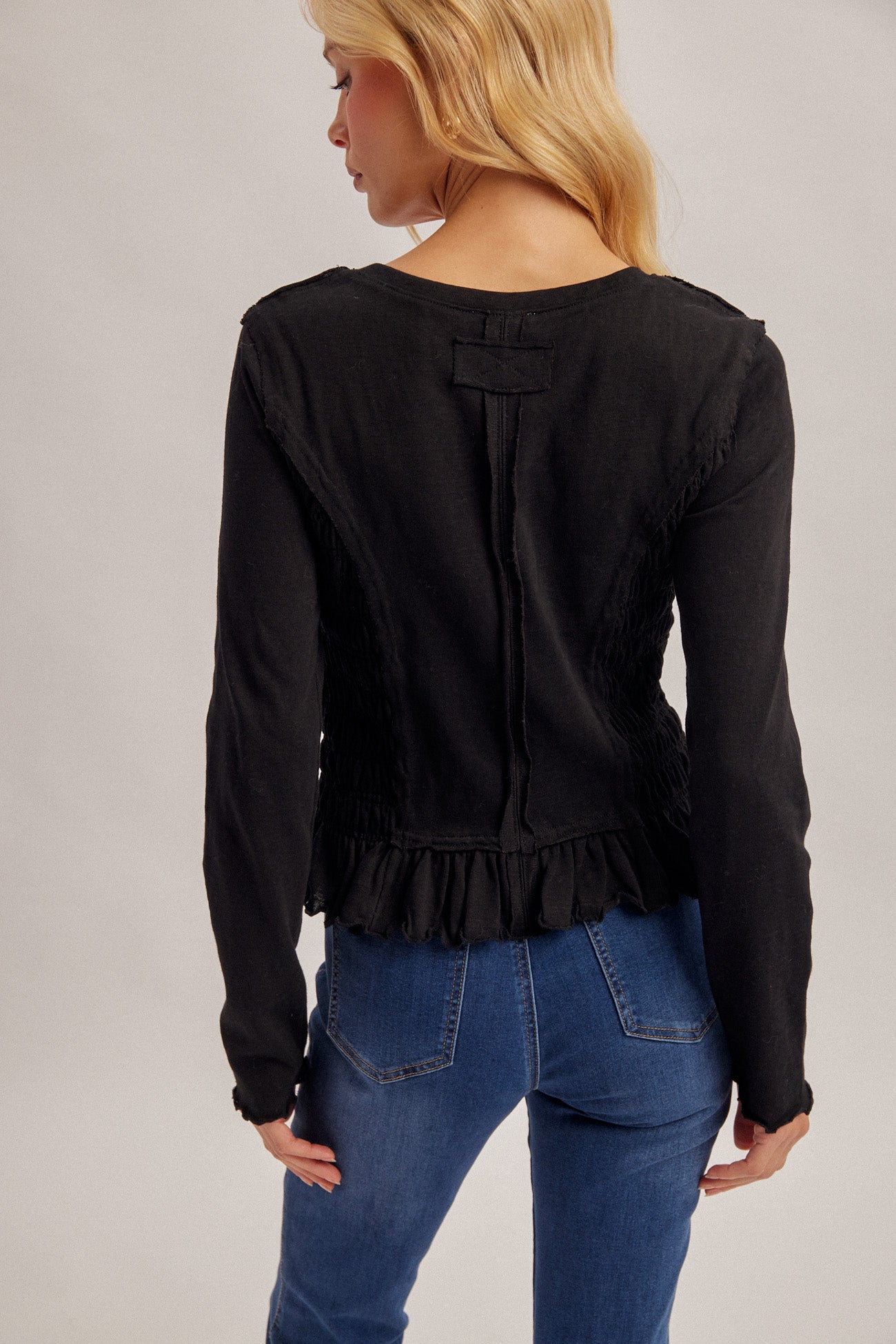 Long Sleeve Top with Ruched Body and Exposed Seaming Detail
