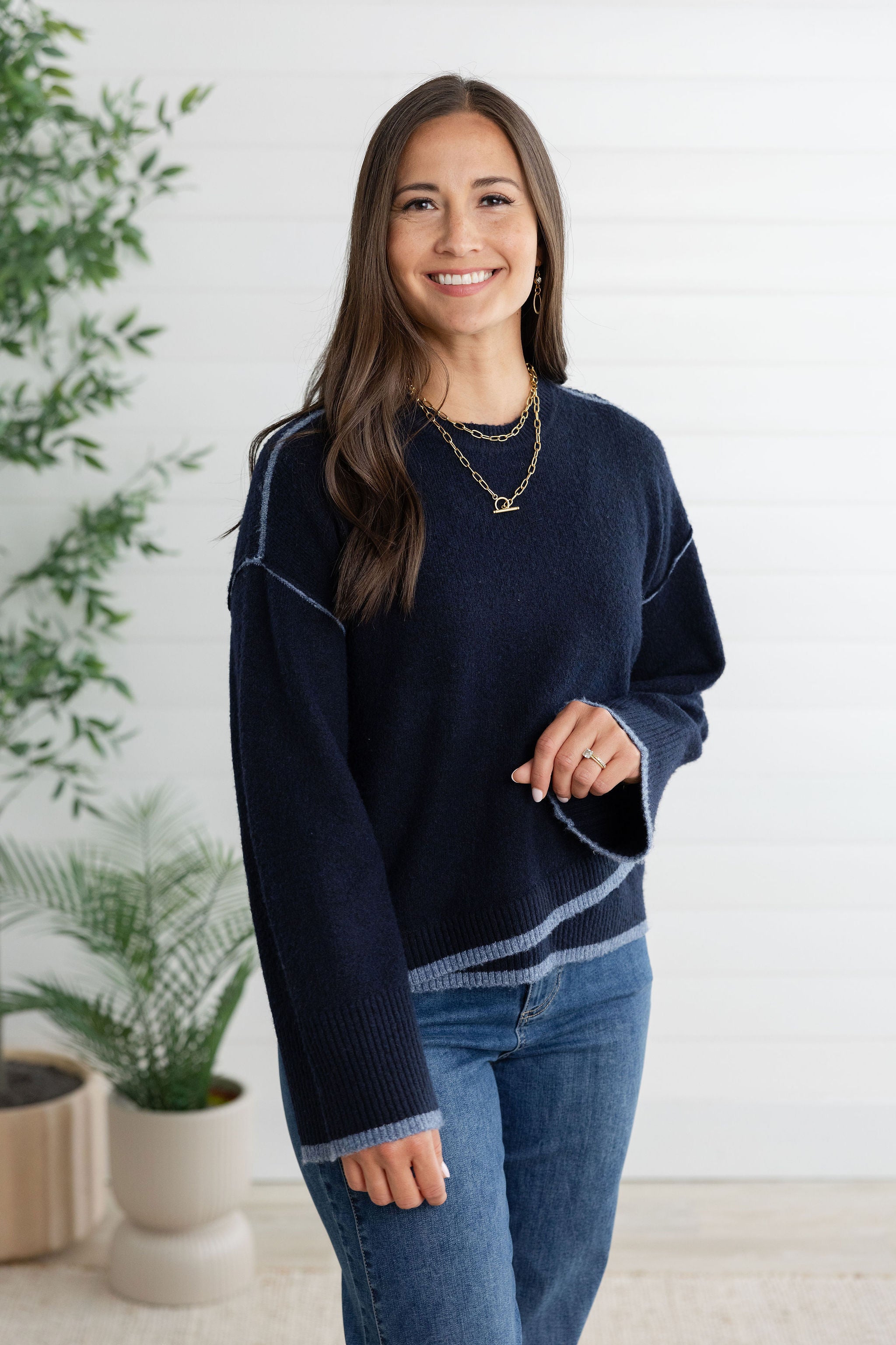 Cozy Knit Sweater with Asymmetrical Hem and Contrast Color Detail